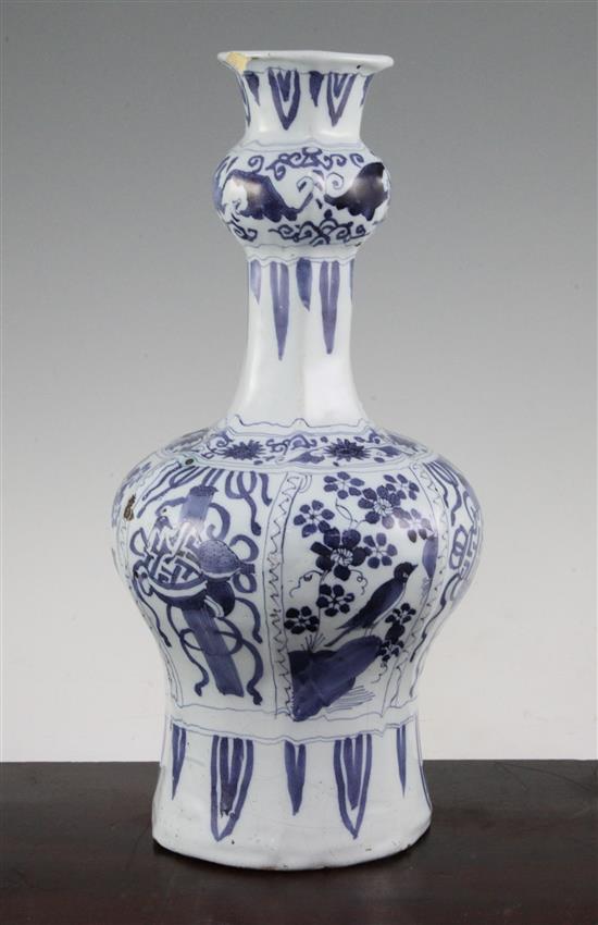 A Delft blue and white bottle vase, c.1700, 32.5cm, drilled and chipped